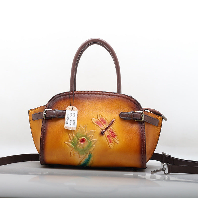 Borsa a tracolla portatile in pelle di mucca modello Elide