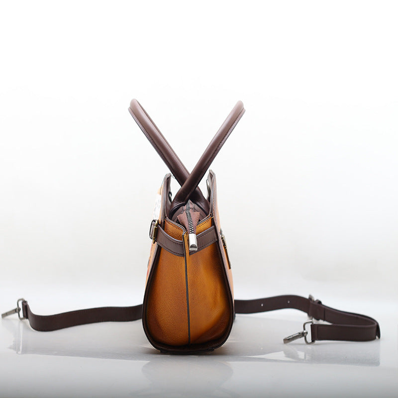 Borsa a tracolla portatile in pelle di mucca modello Elide