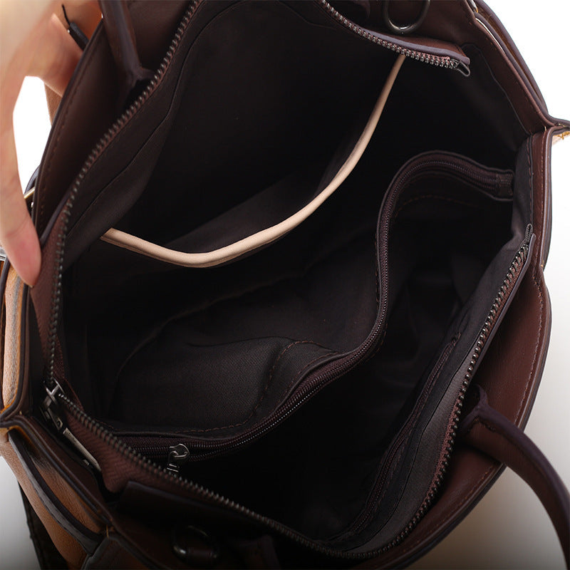 Borsa a tracolla portatile in pelle di mucca modello Elide