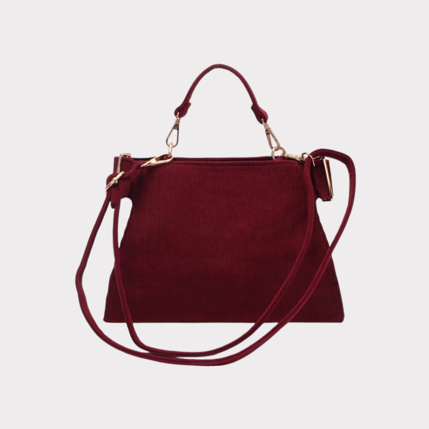 Borsa a tracolla con manico, chiusura a zip ed effetto a coste.MODELLO LOVELACE NERA O BORDEAUX