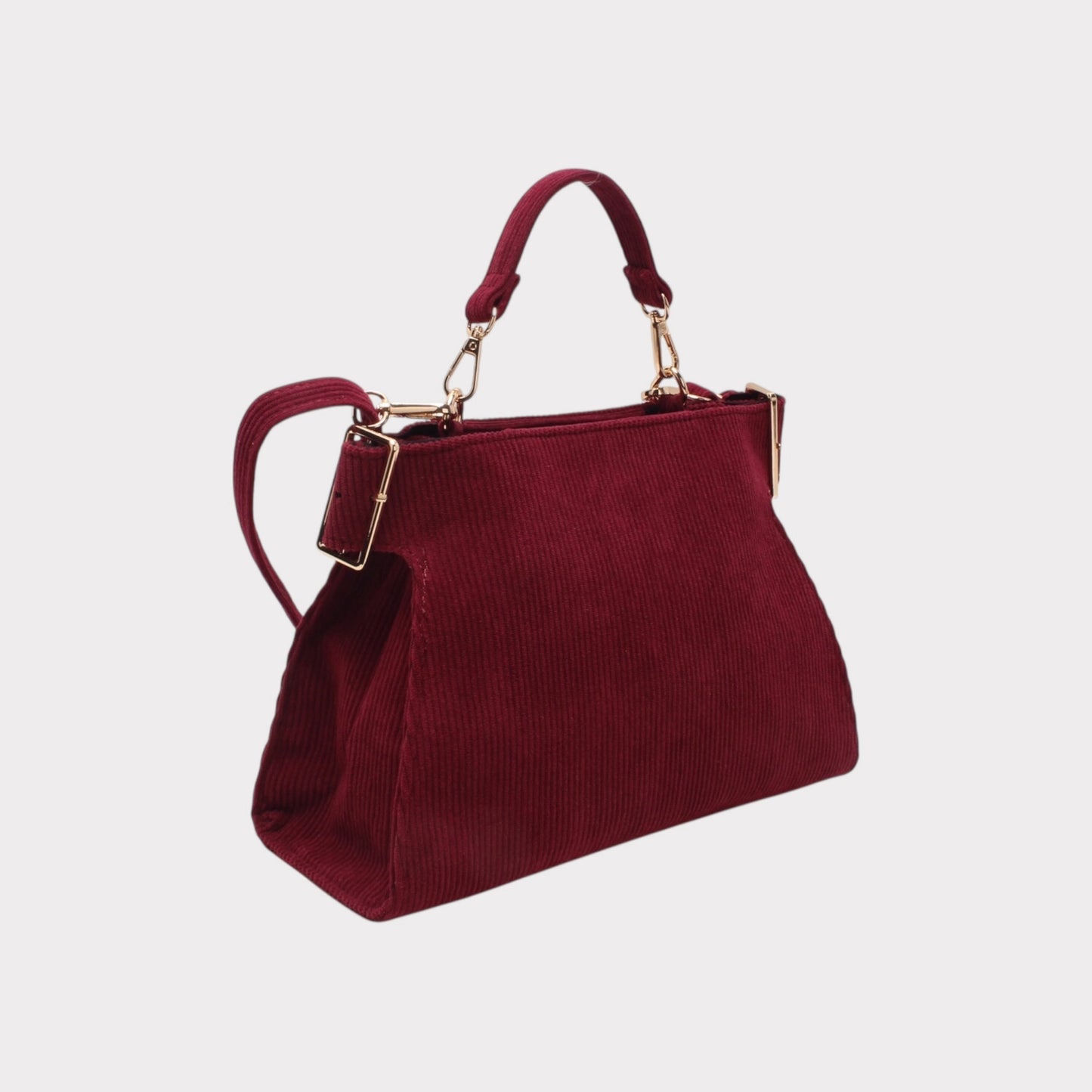 Borsa a tracolla con manico, chiusura a zip ed effetto a coste.MODELLO LOVELACE NERA O BORDEAUX