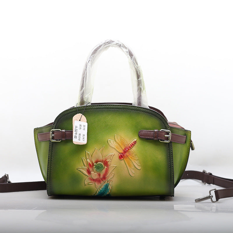 Borsa a tracolla portatile in pelle di mucca modello Elide