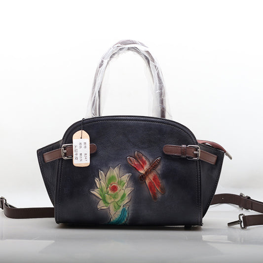 Borsa a tracolla portatile in pelle di mucca modello Elide